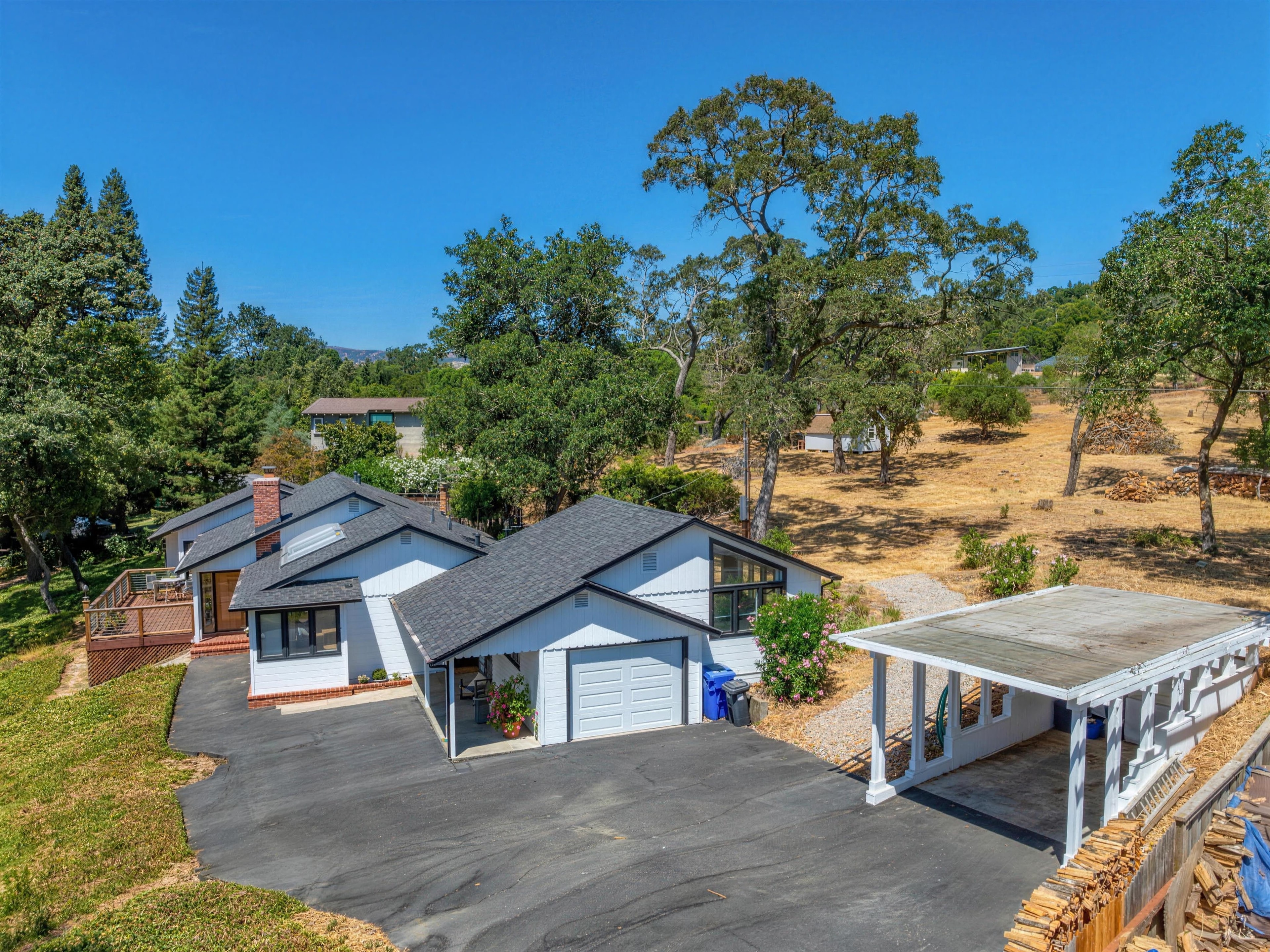 A Napa home set back among mature oaks on a private lane